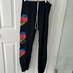 Pure barre sweatpants with rainbow hearts on leg